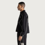 Growth Track Jacket Black back graphic on model