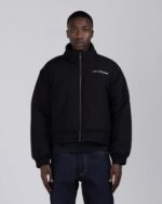 Script Puffer Jacket Black worn by model